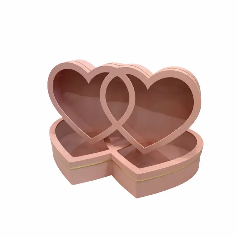 Large pink double heart gift box with clear lid for elegant flower packaging.