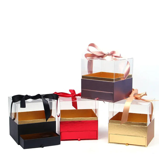 Luxury square flower gift box with acrylic lid, drawer, and ribbon bow.