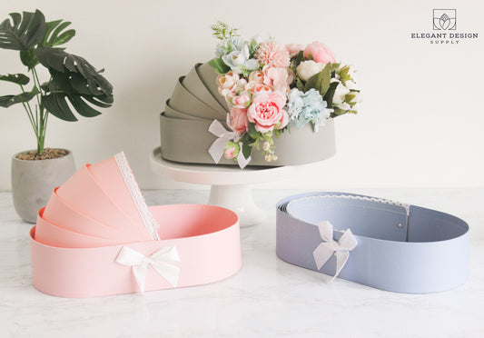 Beautiful Cradle Flower Boxes for baby showers, flower arrangements, and gifts.