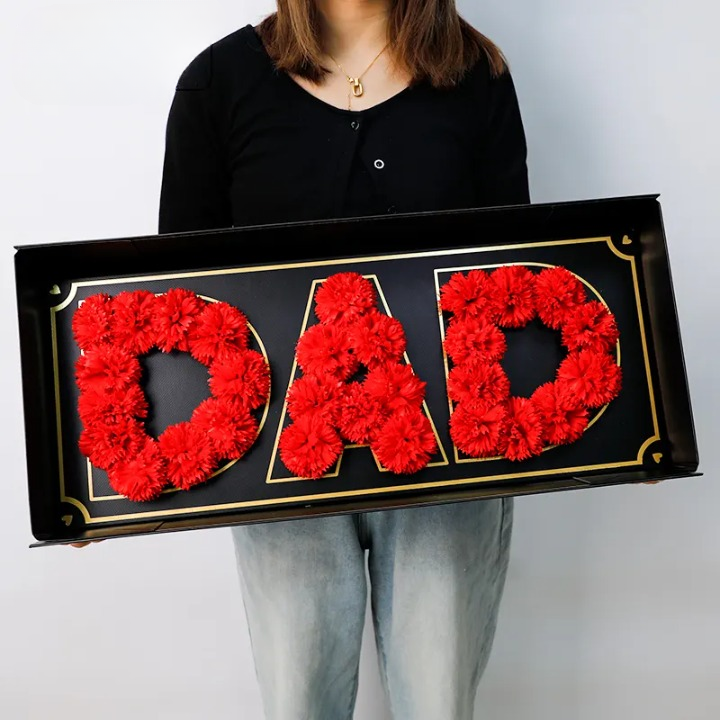 Premium foldable black DAD box for stylish gift presentation.