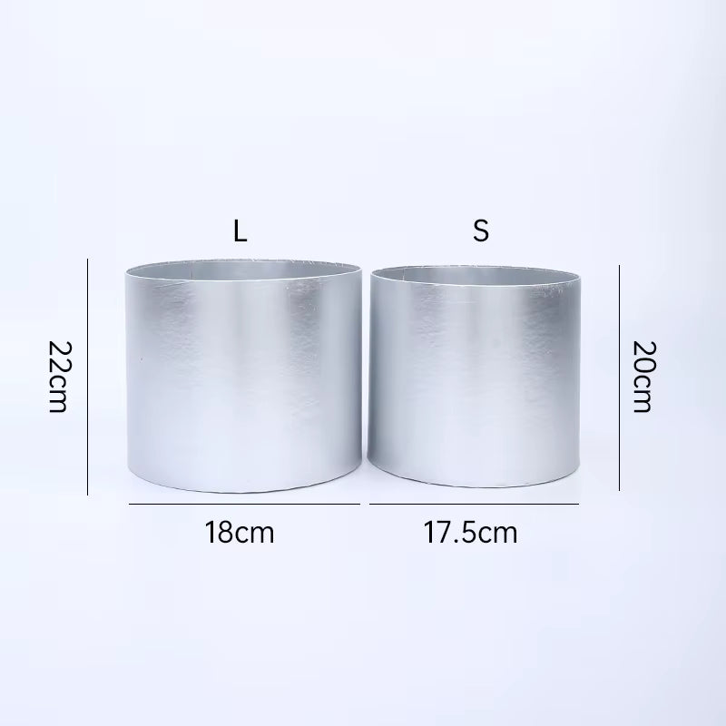 Luxury metallic bouquet boxes in silver, gold, red, and blush tones