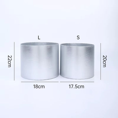 Luxury metallic bouquet boxes in silver, gold, red, and blush tones