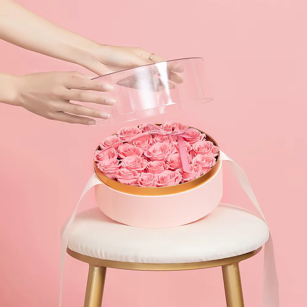 Modern round acrylic box with luxury ribbon wrap