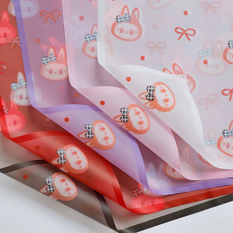 Cute floral wrapping paper with Labubu design and bows