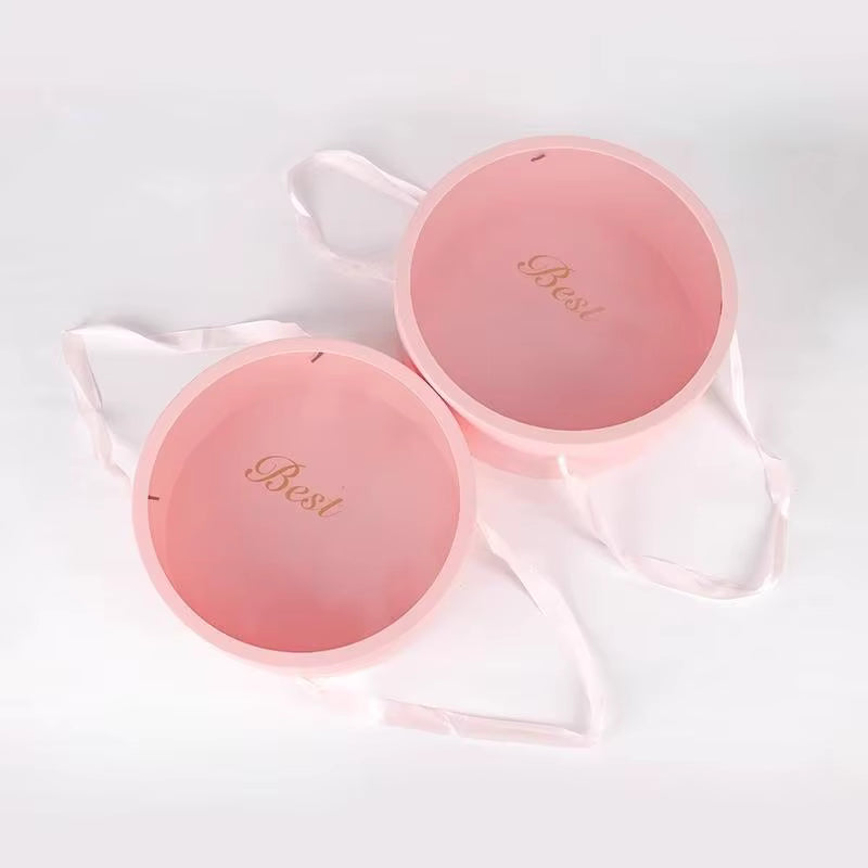 Clear-view round flower box with elegant pink ribbon