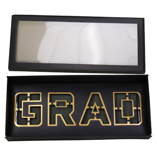 Foldable black GRAD box with clear lid and foam liner for graduation gifts.