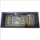 Foldable black DAD box with clear lid and gold outline letters.