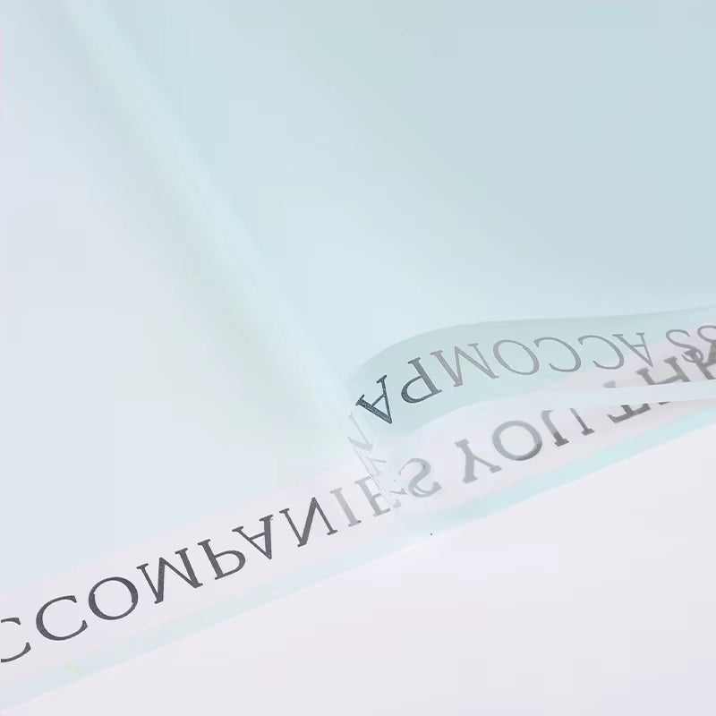 tylish florist-grade plastic wrap with decorative ribbon print