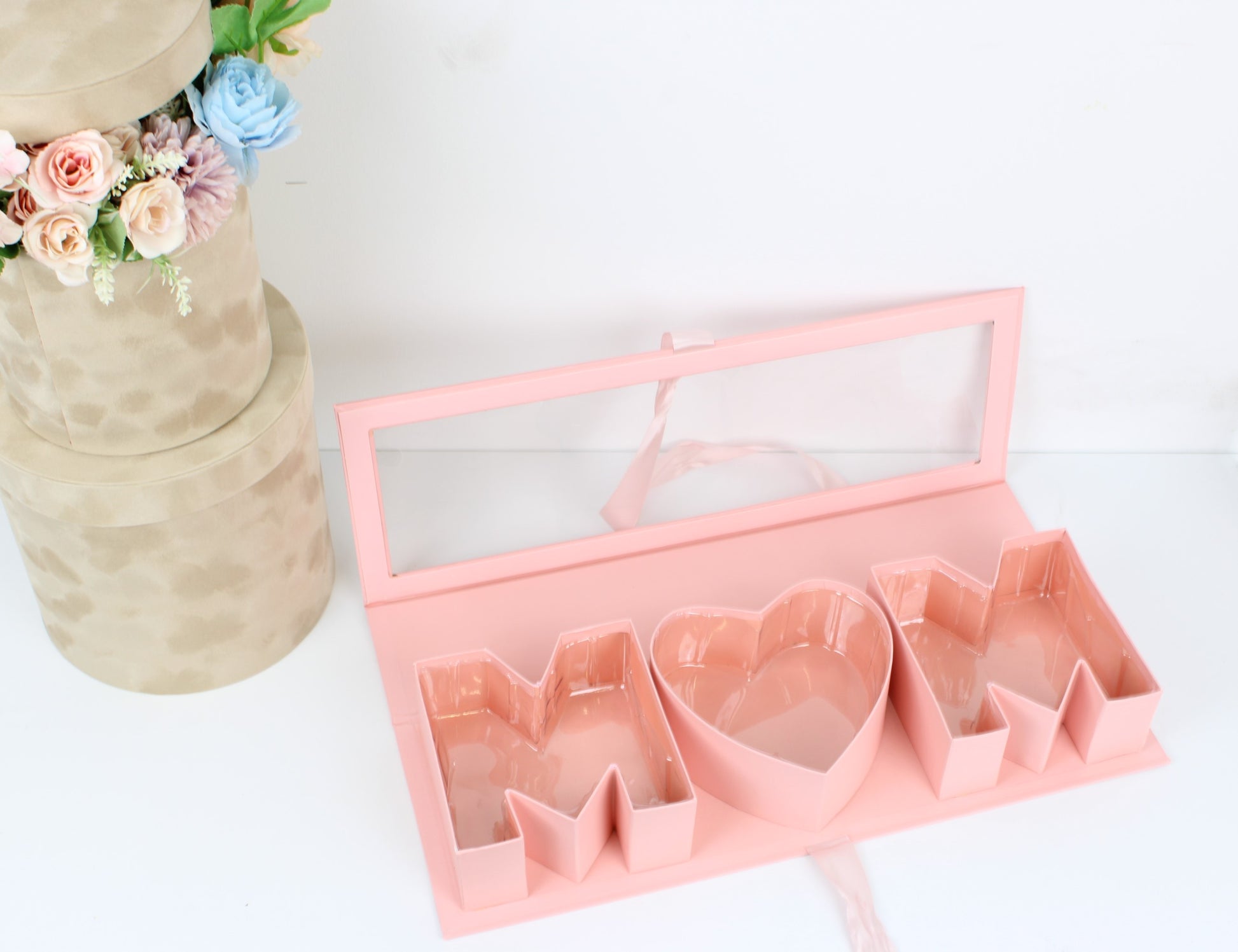 Empty Pink Mother's Day Flower Gift Box  showcasing chocolate strawberries for Mother's Day.