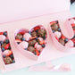Pink "I Love You" heart box for flower arrangements or chocolate strawberries. Perfect for Valentine's Day boxes, wedding decor, and as a food box or candy box.