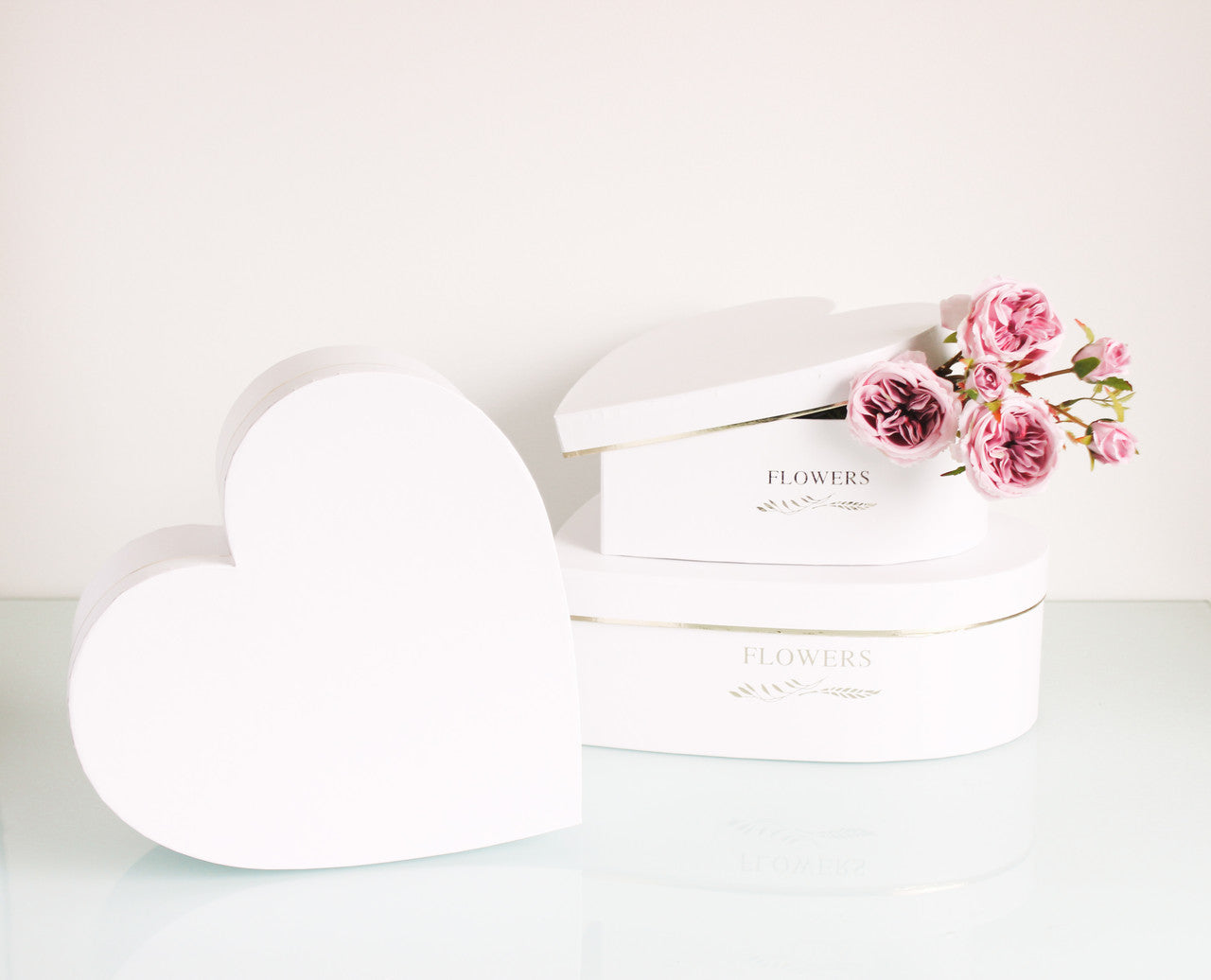 White Heart Boxes for luxury flower arrangements, chocolate strawberries, and gifts.