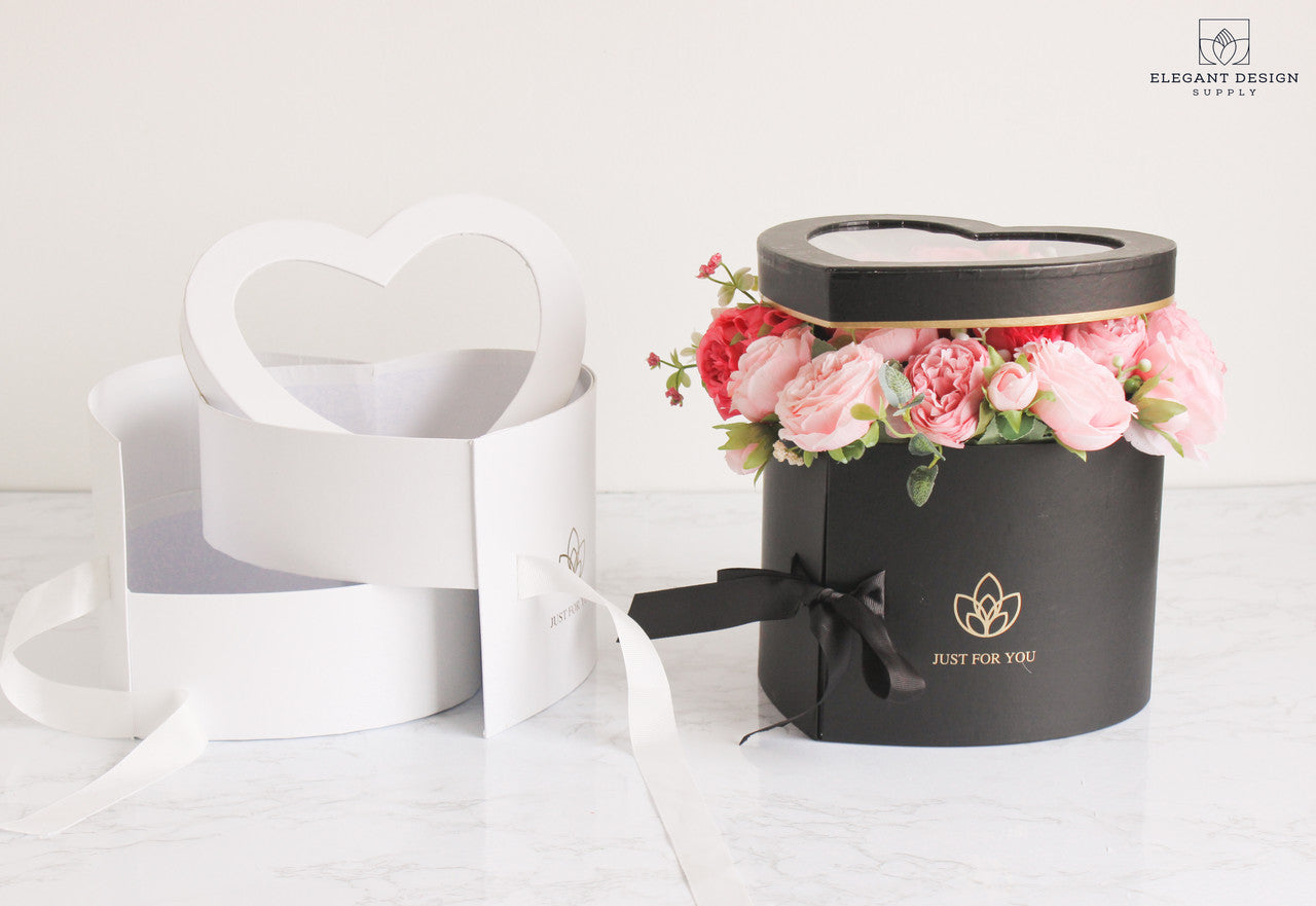 Heart-shaped flower box with a clear lid for flower bouquets, chocolates, or wedding décor. Ideal gift, floral supply, and food packaging